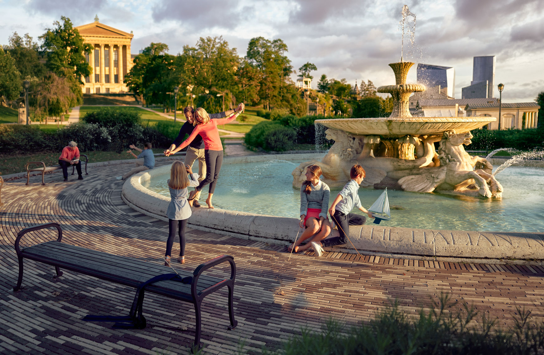 Family enjoying a beautiful fountain in Philadelphia