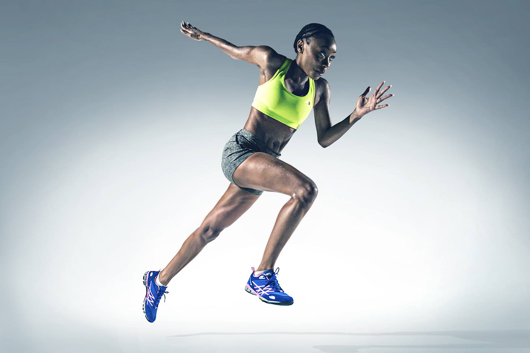 Kevin Steele - Studio portrait of an athlete sprinting