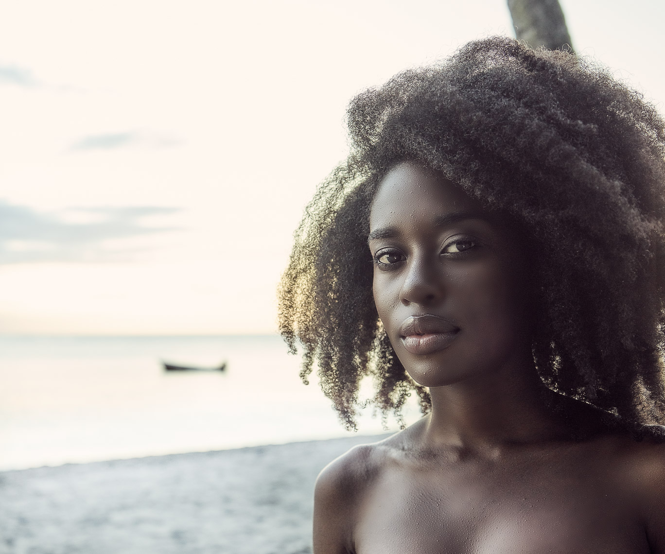 Kevin Steele - portrait on the beach of a beautiful black woman