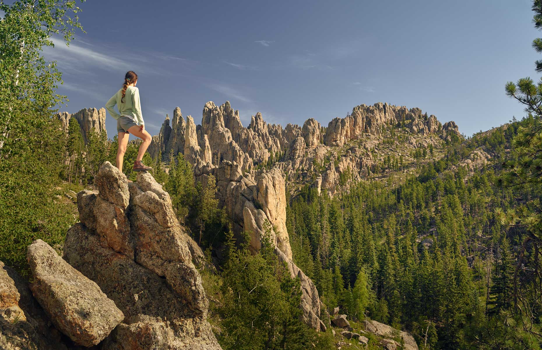 Kevin Steele - A woman hiking the South Dakota Black Hills