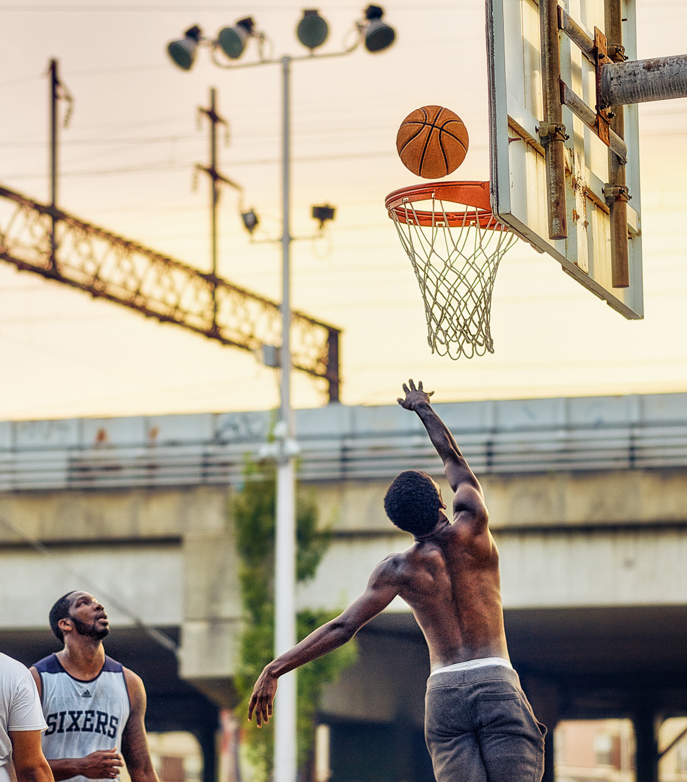 Kevin Steele - basketball players in an urban park
