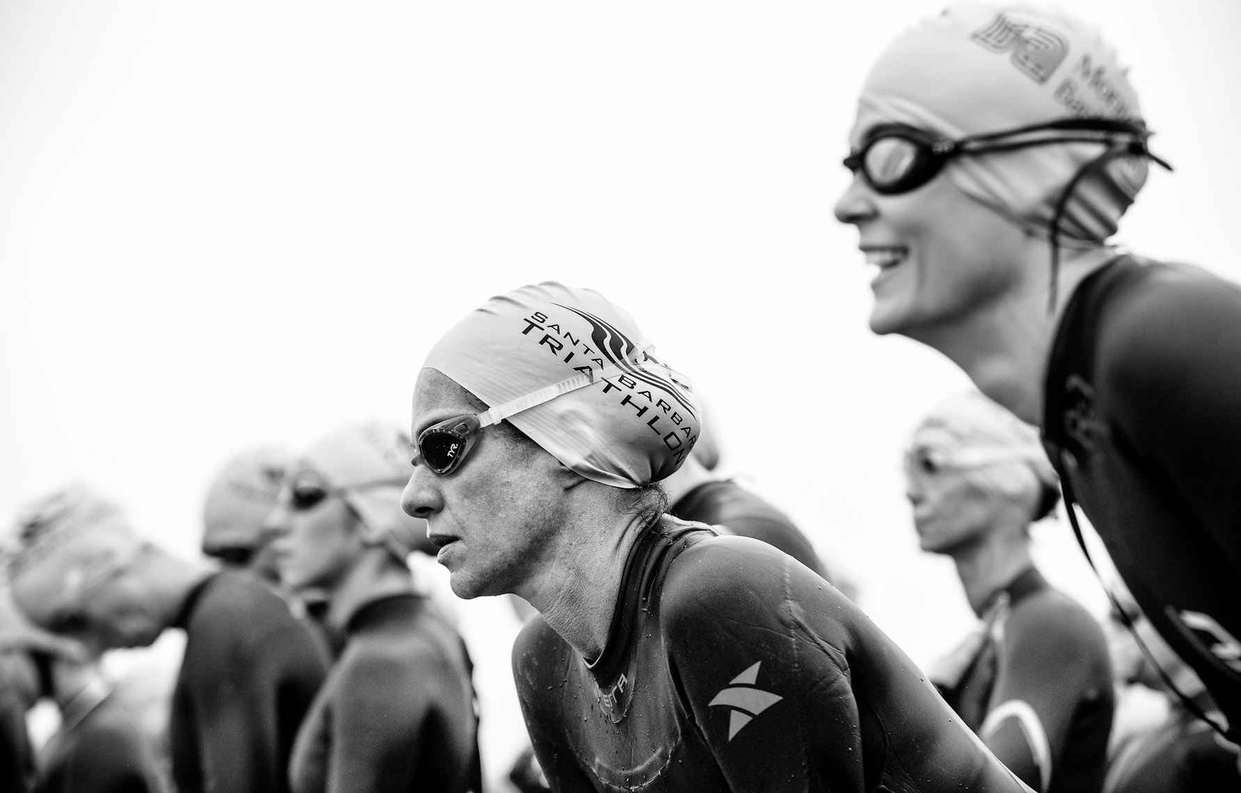 Kevin Steele - close up of triathletes faces at the starting line