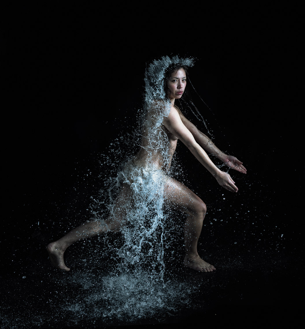 Kevin Steele - studio portrait of falling water over a body