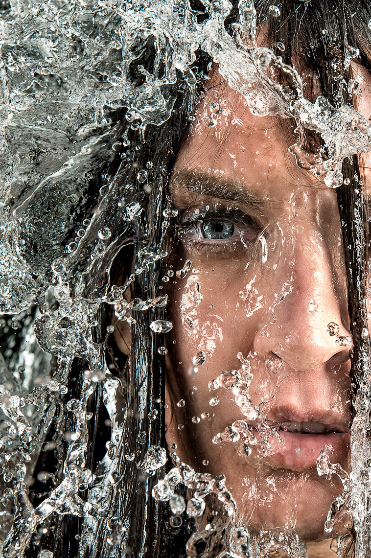 Kevin Steele - close up of water falling down woman