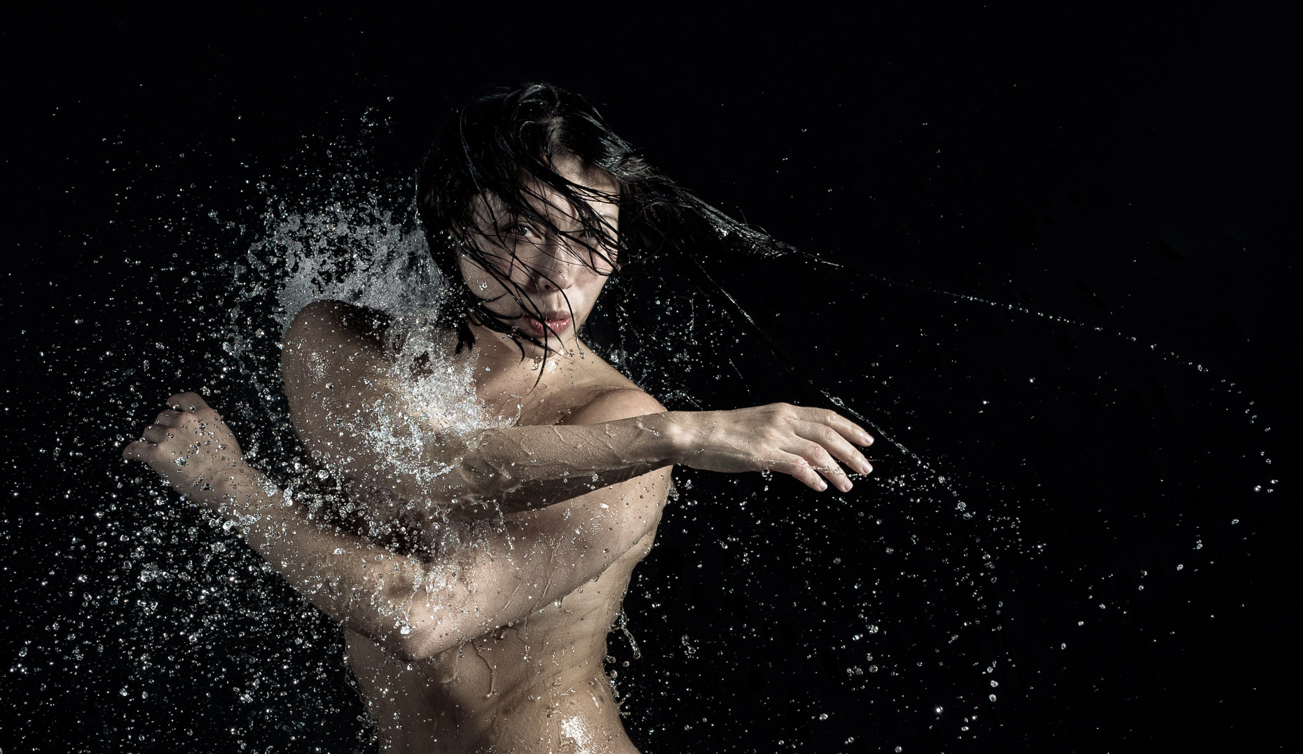 Kevin Steele -  studio portrait under falling water